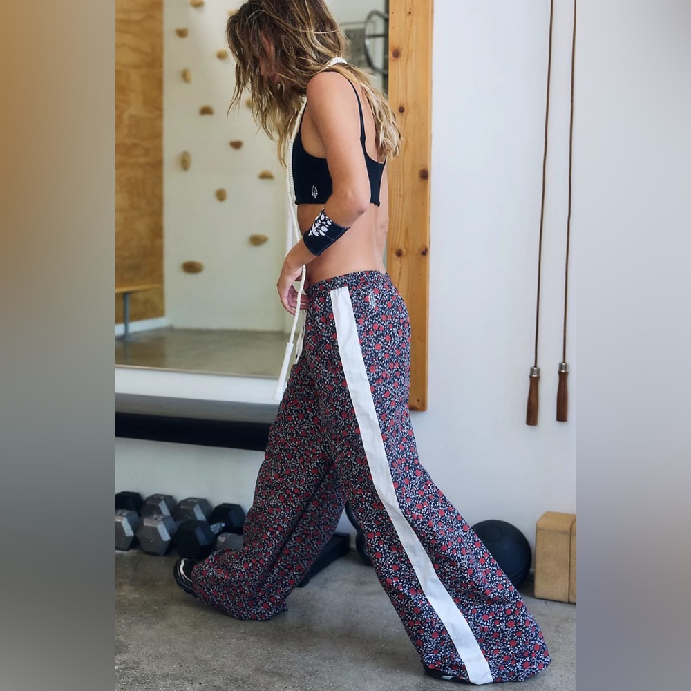 FP Movement by Free People Black Floral Track Pants with White Side Stripe